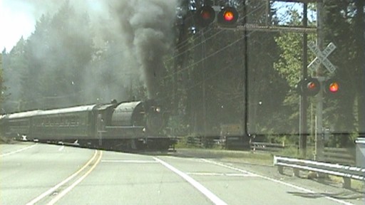 Picture of train on level crossing